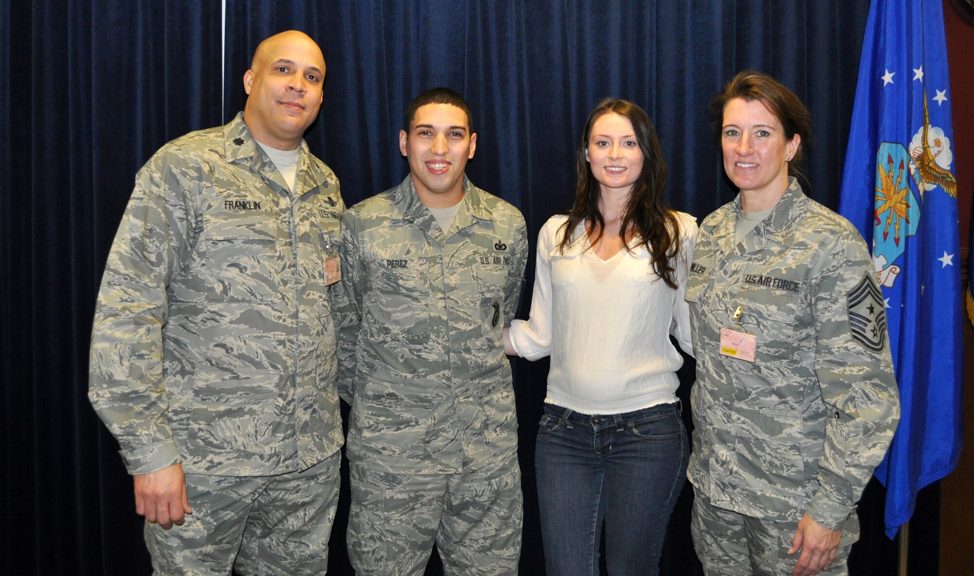VOLKEL AIR BASE, The Netherlands -- Pablo Perez-Gonzalez, 703rd Munitions Support Squadron, is congratulated Jan. 13 immediately following his Stripes for Exceptional Performers promotion to technical sergeant. (U.S. Air Force/Courtesy photo)