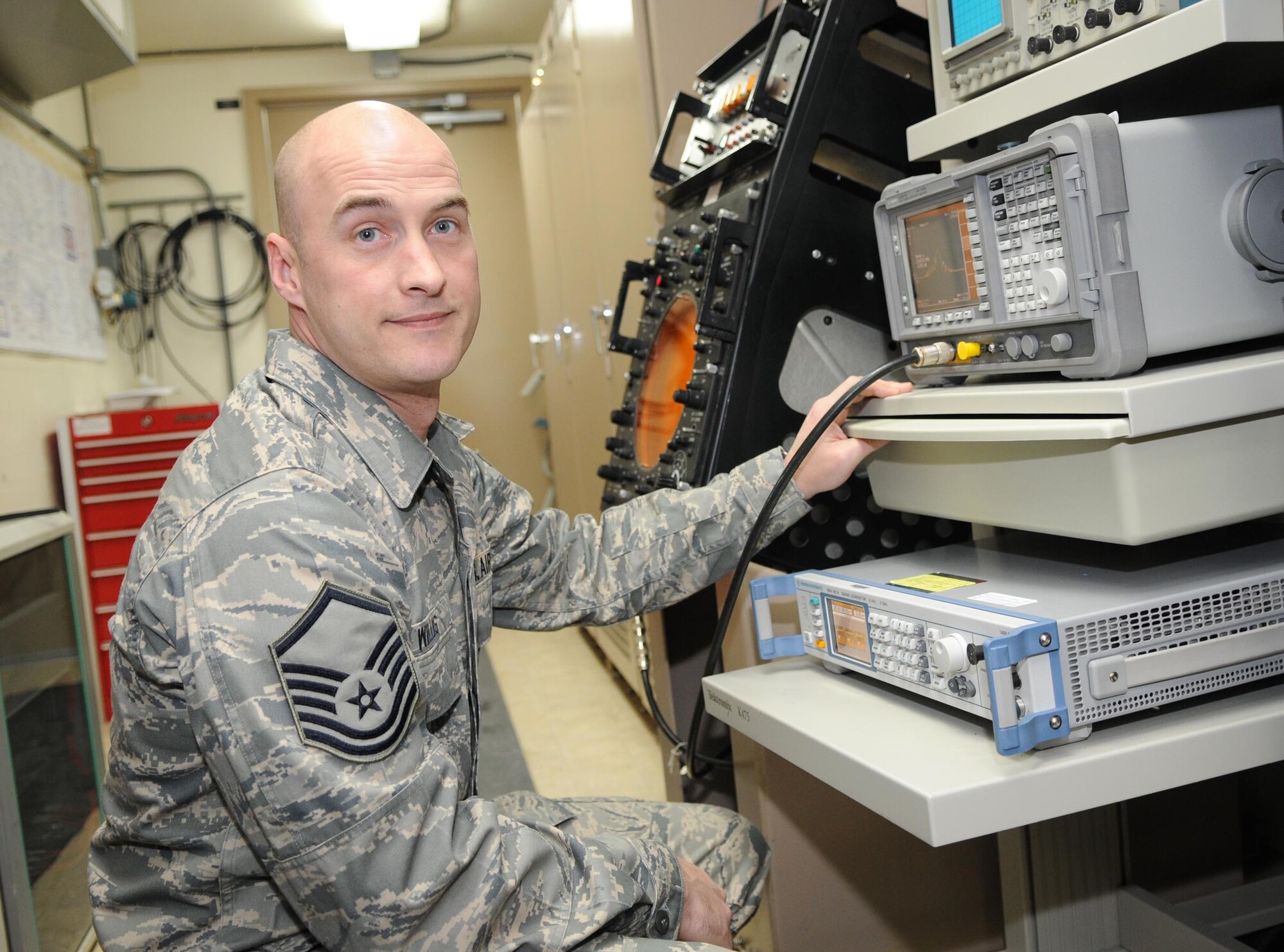 SPANGDAHLEM AIR BASE, Germany – Francis Willis, 52nd Communications Squadron radar systems section chief, finishes performing a frequency check on antenna equipment Jan. 6. Sergeant Willis received a Stripes for Exceptional Performers promotion to master sergeant for continually doing outstanding work. (U.S. Air Force photo/Airman 1st Class Matthew B. Fredericks)
