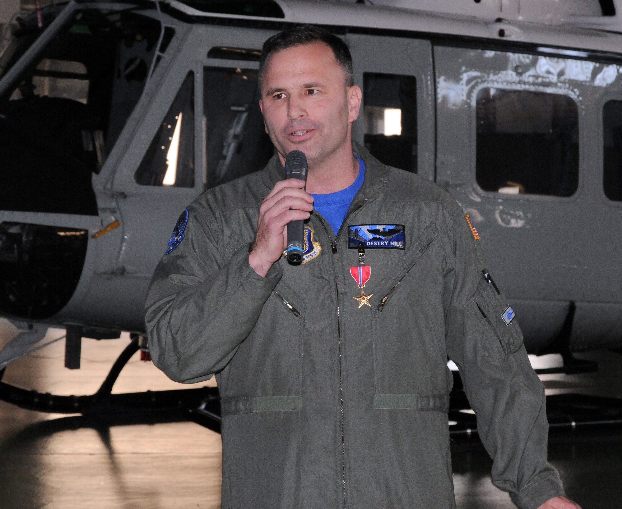 YOKOTA AIR BASE, Japan -- Maj. Destry Hill, 374th OG assistant director of operations, says a few words after receiving a Bronze Star during a ceremony, here Jan. 14. The Bronze Star Medal is awarded to individuals for acts of heroism or meritorious achievement in ground combat. (U.S. Air Force photo/Airman 1st Class Katrina R. Menchaca)