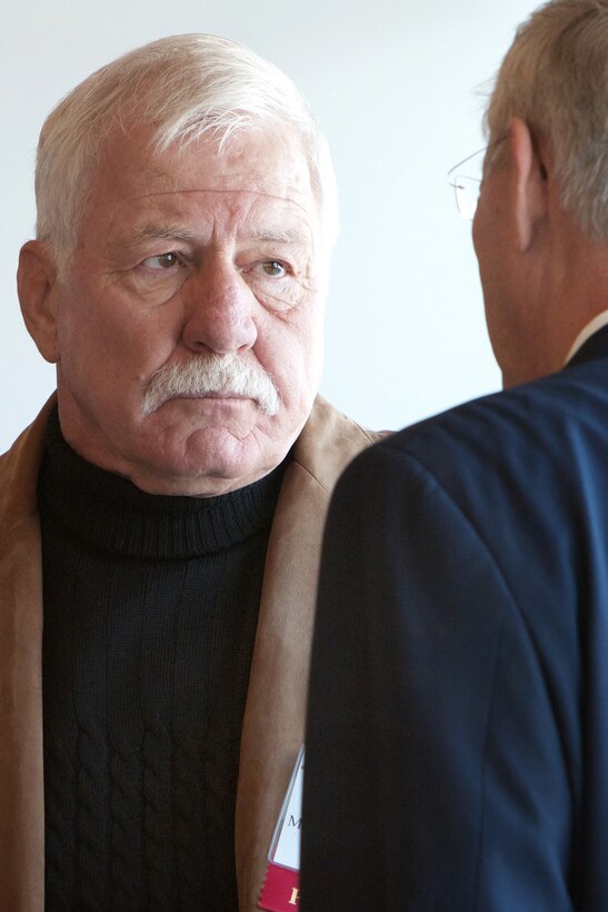 Retired Lt. Col. Logan Fitch, a member of the rescue team, catches up with another participant during the observation of the 30th anniversary of the Iranian hostage crisis of 1979-1980 at the U.S. Military Academy at West Point, N.Y., Jan. 21, 2011.