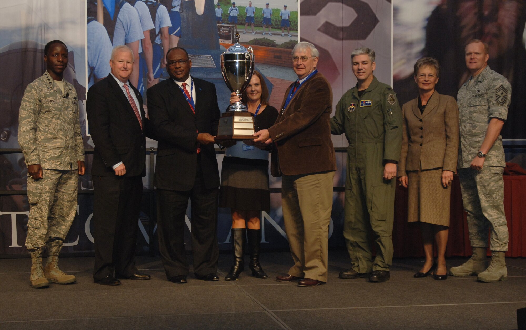 Members of the Columbus, Miss., community accept the Air Education and Training Command Community Support Award, also known as the Altus Trophy, for best community support to a military installation in AETC. This is the first year the award has been presented. (U.S. Air Force photo/Staff Sgt. Bryan Franks). 