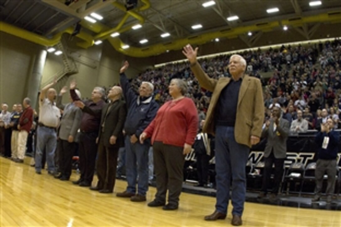 Thirty years after their release, cadets and fans at the U.S. Military Academy at West Point, N.Y.,  welcome the former Iranian hostages at the start of the men's Army/Navy basketball game, Jan 22, 2011. In January 1981, West Point served as a waypoint when the nation cheered the return of a group of American citizens taken hostage at the U.S. embassy in Iran.  