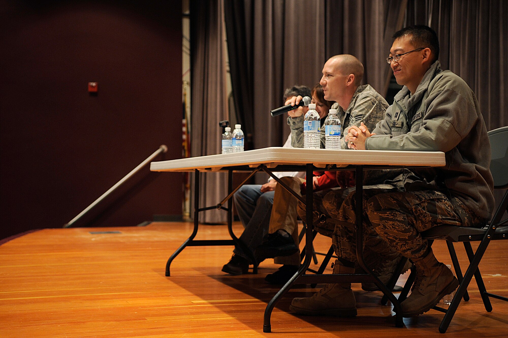 VANDENBERG AIR FORCE BASE, Calif. -- Staff Sgt. Charles Heairet, a 30th Civil Engineer Squadron explosives ordnance disposal technician, shares his deployment story during the Theater of War event at the base theater here Thursday, Jan. 20, 2011.  The members spoke about their personal experiences about being deployed.  (U.S. Air Force photo/Senior Airman Andrew Satran) 