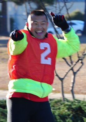 MOODY AIR FORCE BASE, Ga.-- Sam Lowie cheers at the end of the Polar Bear Triathlon Jan. 22. Lowie finished first for the top male category; his finish time was 1:30:30. (U.S. Air Force photo/Senior Airman Stephanie Mancha)(RELEASED)