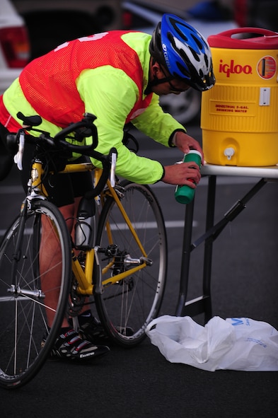MOODY AIR FORCE BASE, Ga.--Sam Lowie fills up his water bottle before riding 13 miles on his bike during the Polar Bear Triathlon Jan. 22. Lowie was the first to finish the swimming portion of the triathlon, giving him the edge to win the race. (U.S. Air Force photo/Senior Airman Stephanie Mancha)(RELEASED)
