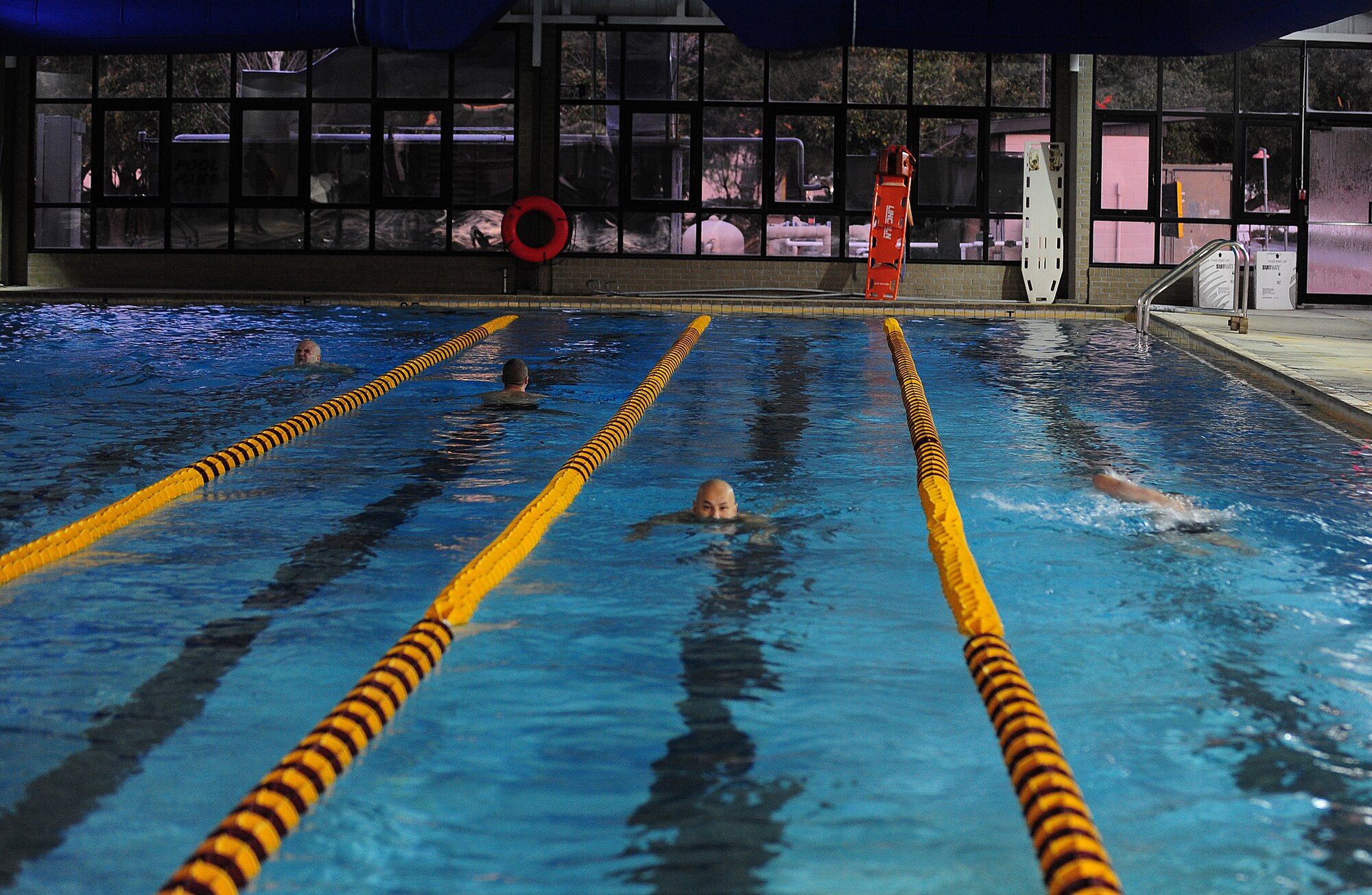 MOODY AIR FORCE BASE, Ga.-- Participants of the Polar Bear Triathlon work to finish eight laps in the pool Jan. 22. Participants tried different swimming techniques to finish the eight laps in the pool. (U.S. Air Force photo/Senior Airman Stephanie Mancha)(RELEASED)