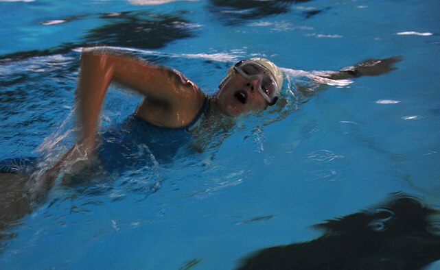 MOODY AIR FORCE BASE, Ga.--Amanda Merck swims her last lap during the Polar Bear Triathlon Jan. 22. Swimming eight laps was the first obstacle that needed to be accomplished before proceeding to the bike ride and run. (U.S. Air Force photo/Senior Airman Stephanie Mancha)(RELEASED)