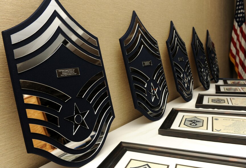MOODY AIR FORCE BASE, Ga.-- Each chief master sergeant select recieved a plaque and medallion during the Chief Recognition Ceremony Jan. 22 to recognize their accomplishment of being promoted to the highest enlisted rank. Col. Gary Henderson, 23rd Wing commander, presented each senior master sergeant with their plaque and certificate. (U.S. Air Force photo/Airman 1st Class Benjamin Wiseman)(RELEASED)