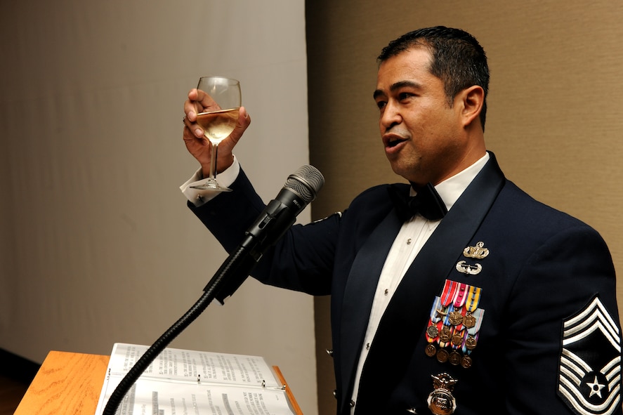 MOODY AIR FORCE BASE, Ga.-- Chief Master Sgt. Joseph Pritchard, Moody Chief’s Group president, raises a glass and gives a toast to Moody’s next group of chief master sergeants during the Chief Recognition Ceremony Jan. 22. Chief Pritchard spoke about the dedication and sacrifice it takes to make it to the highest enlisted rank.  (U.S. Air Force photo/Airman 1st Class Benjamin Wiseman)(RELEASED)