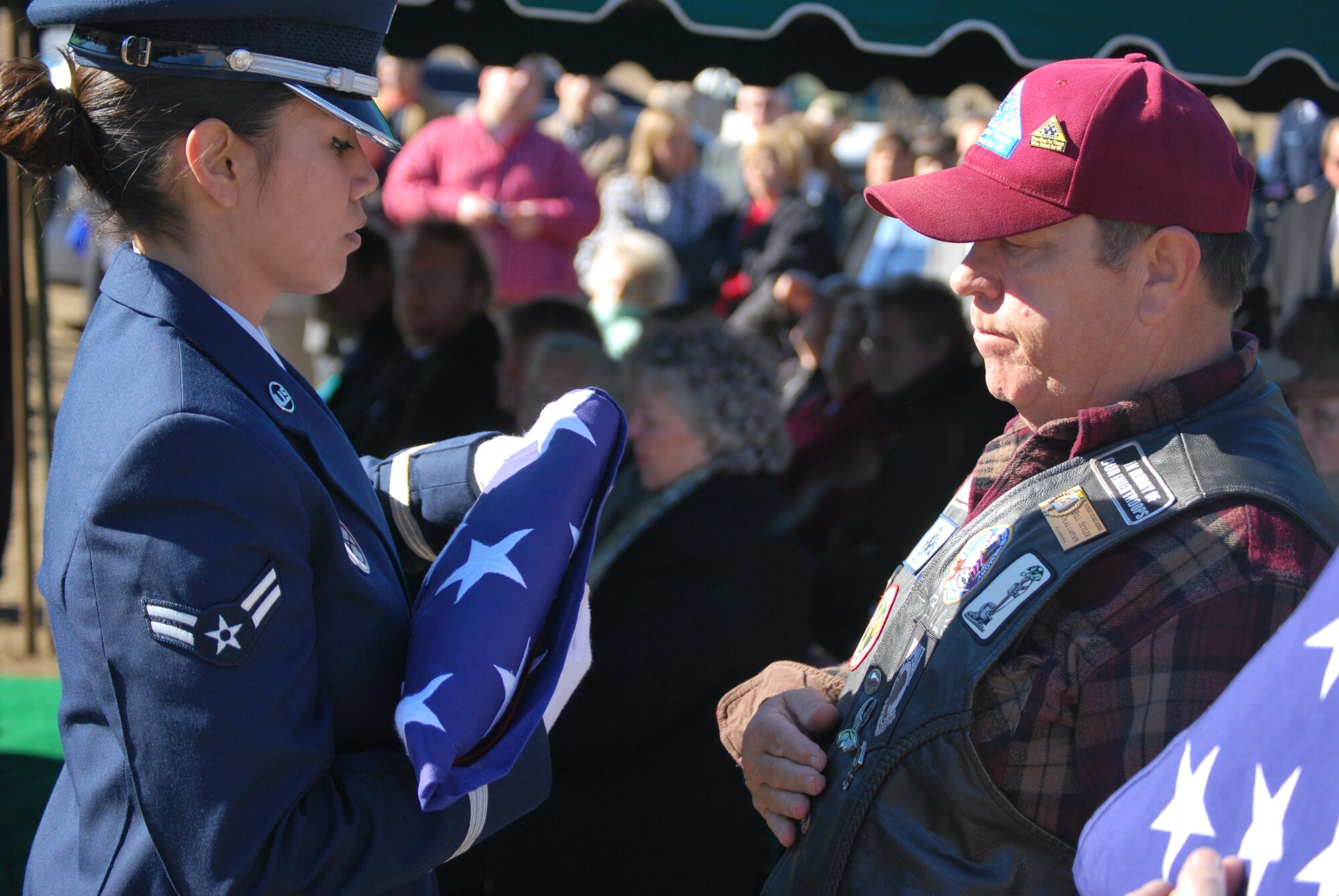 Honor Guard from Eglin Air Force Base inspects a flag that will be presented to the family of 1st Lt. Robert Franklin Dees. (U.S. Air Force photo/Van Williams)