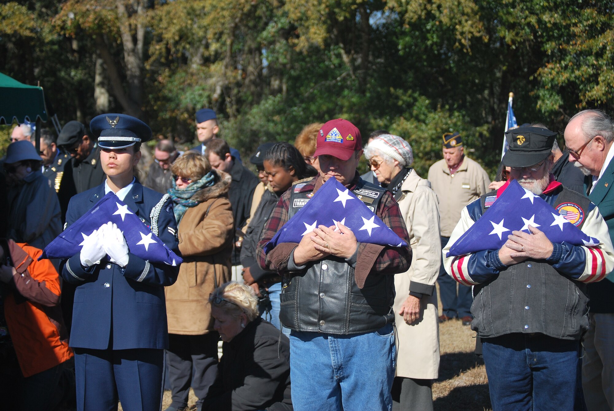Members of the Patriot Guard and Honor Guard from Eglin Air Force Base hold flags that will be presented to the family of 1st Lt. Robert Franklin Dees. (U.S. Air Force photo/Van Williams)