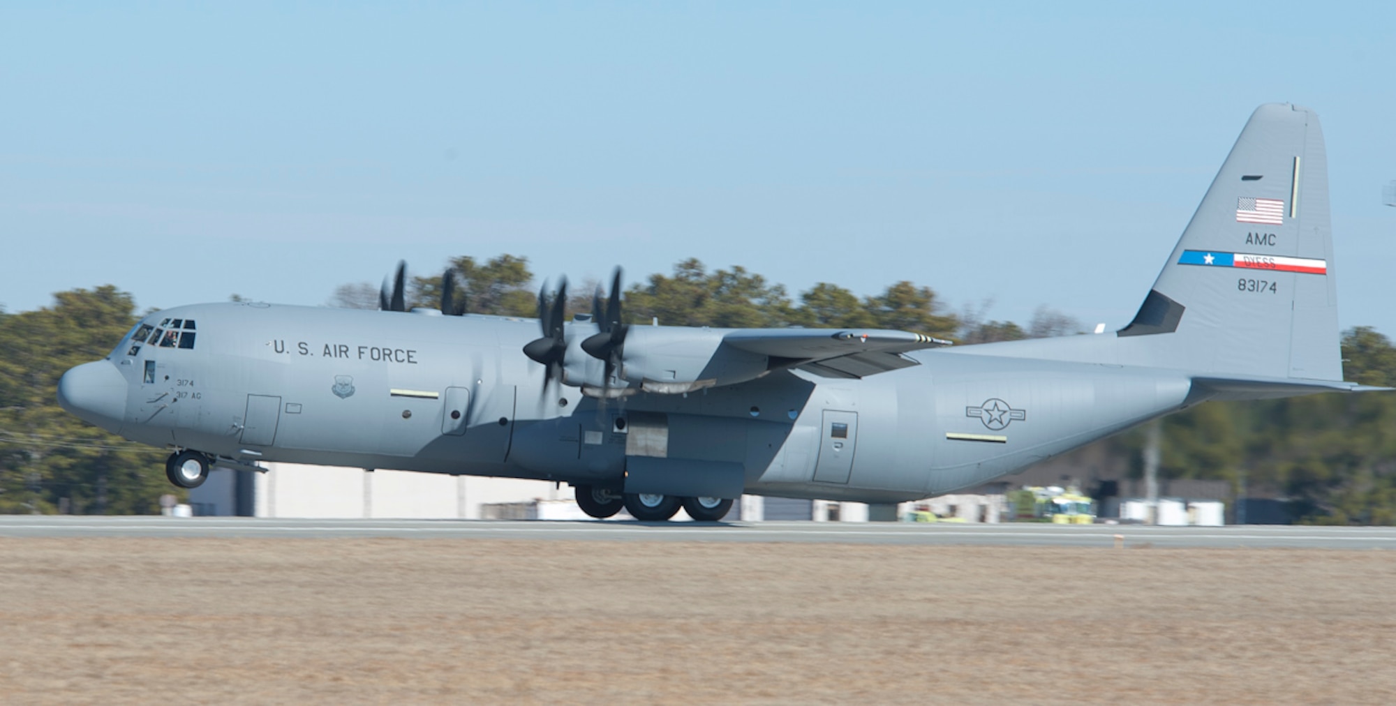 DYESS AIR FORCE BASE, Texas—Col. Lawrence M. Martin Jr., Air Mobility Command deputy A3, lands a C-130J Super Hercules here Jan. 21. The aircraft is the fifth of 28 to be delivered to Dyess by 2013, replacing the current aging fleet of C-130 Hercules models. “Today marks the day where the capability of 317 AG, Air Mobility Command and the Air Force has significantly increased, and starts another 50 years of C-130 presence in Abilene,” said Col. Dan P. Dagher, 317th Airlift Group commander. (Air Force photo/ Airman First Class Courtney Moses)