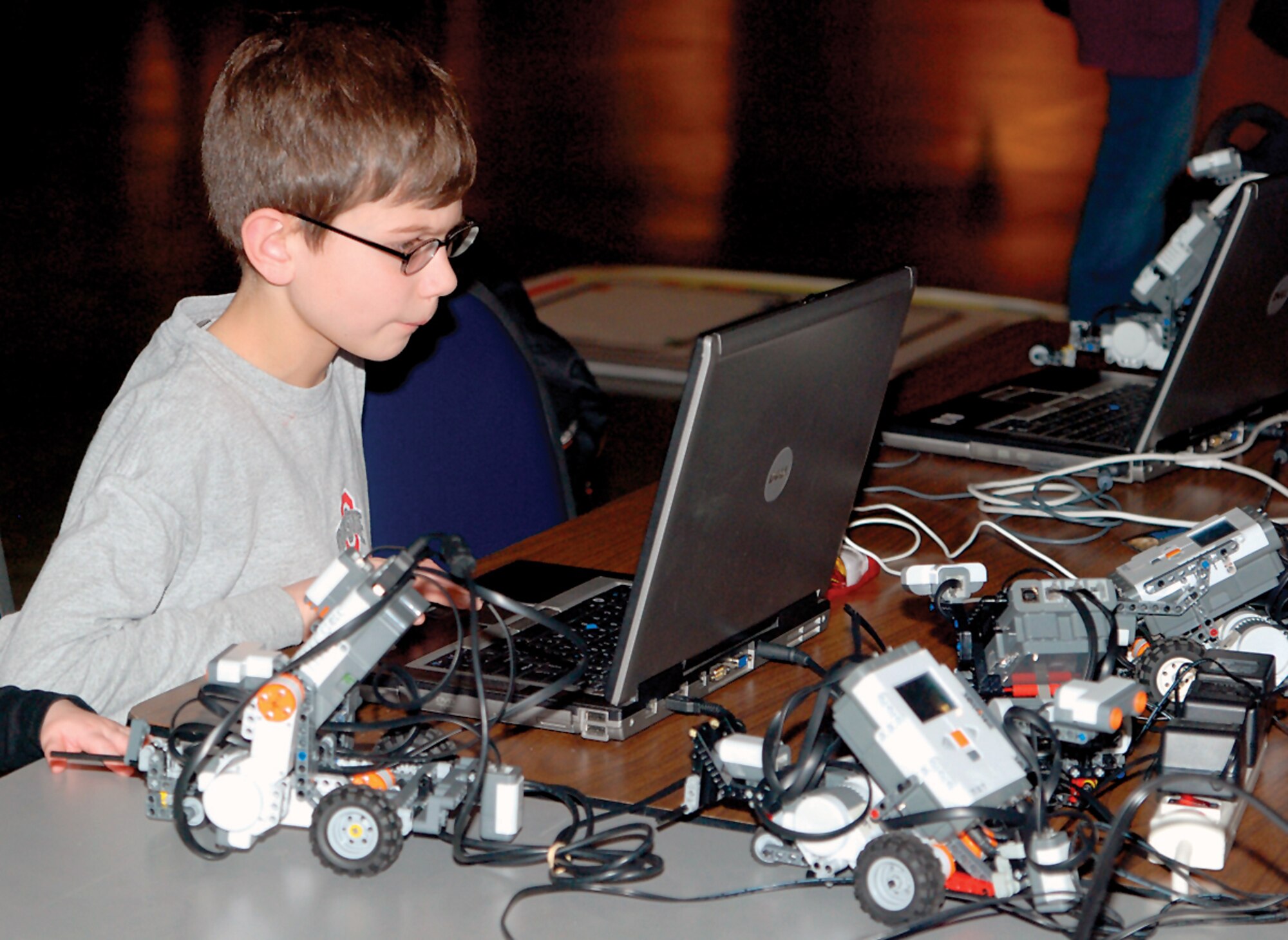 DAYTON, Ohio (01/2011) -- Children and adults of all ages enjoyed learning about robotics during Family Day at the National Museum of the U.S. Air Force. (Photo courtesy of The Wright Flyer, Greene County Dailies)