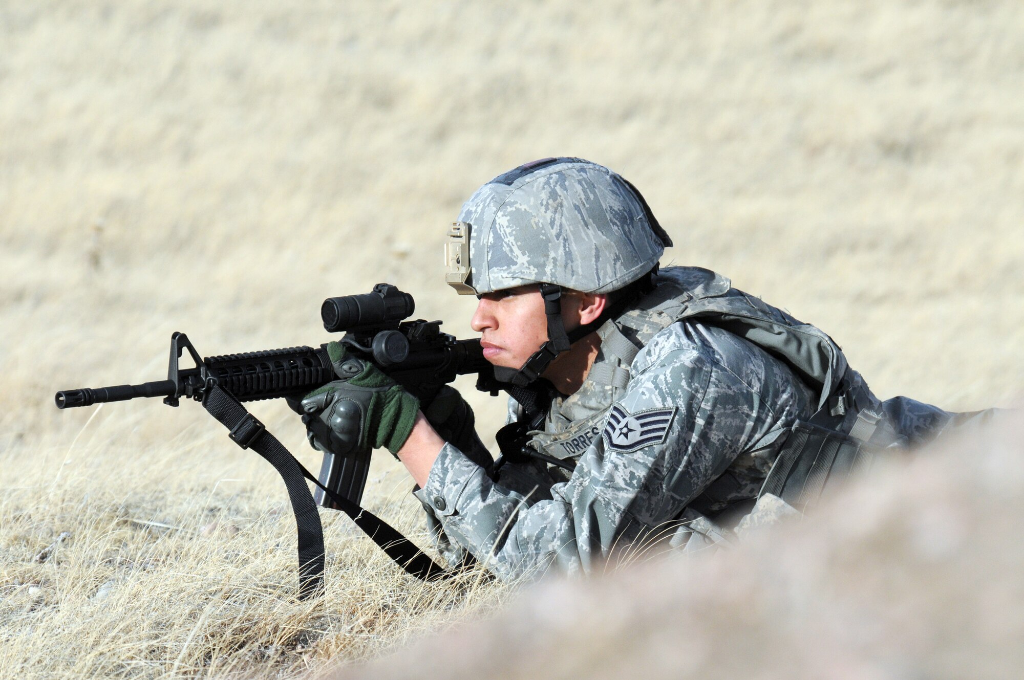 Staff Sgt. Renaldo Torres takes aim during an exercise Jan. 13, 2011, at F.E. Warren Air Force Base, Wyo. Sergeant Torres is assigned to the 790th Missile Security Forces Squadron. (U.S. Air Force photo/R.J. Oriez)