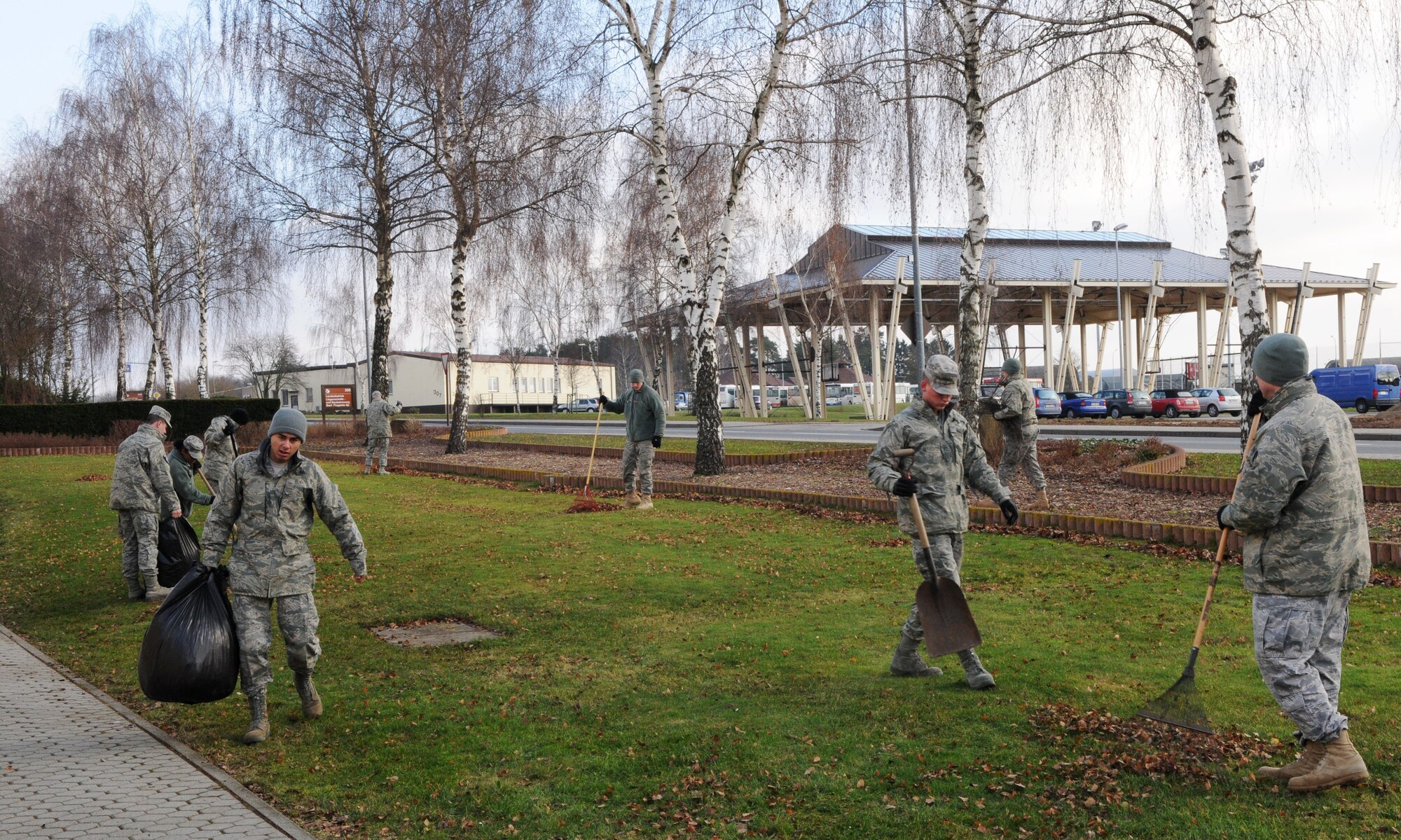 SPANGDAHLEM AIR BASE, Germany – Members of the 52nd Communications Squadron’s network control center participate in a base-wide cleanup outside the NCC Jan. 21. The 52nd Fighter Wing held a base-wide cleanup in preparation for the Installation Excellence Award team’s arrival Jan. 24. Spangdahlem Air Base is competing against Travis Air Force Base, Calif., for the IEA. (U.S. Air Force photo/Airman 1st Class Matthew B. Fredericks)