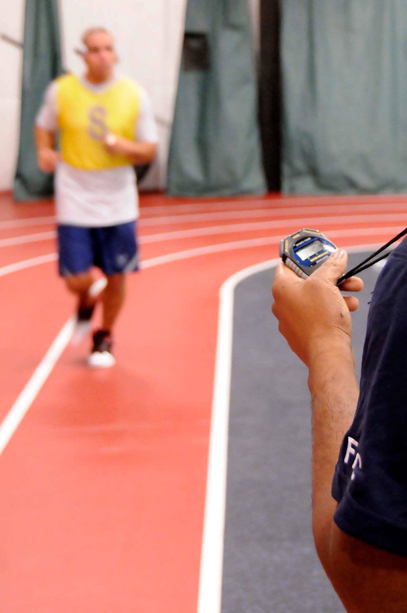 AIR FORCE DISTRICT OF WASHINGTON -- Senior Airman Jonathan Ramos, U.S. Air Force Honor Guard body bearer, runs against the clock during a physical training test Jan. 18 at Joint Base Andrews. USAF Honor Guard members keep in top physical condition at all times to meet high standards set by themselves as well as the AF. (U.S. Air Force photo by Senior Airman Steele C. G. Britton)