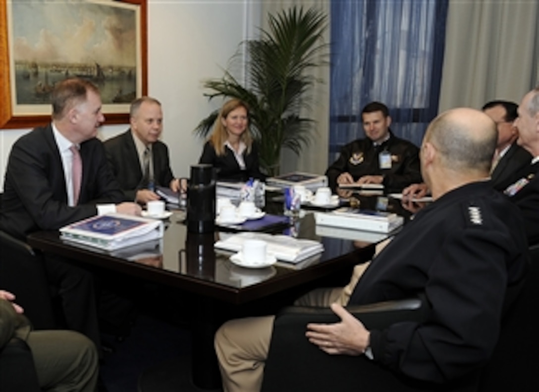 Deputy Secretary of Defense William J. Lynn III meets with NATO's Supreme Allied Commander Europe Adm. James Stavridis and his staff at NATO Headquarters in Brussels, Belgium, on Jan. 24, 2011.  