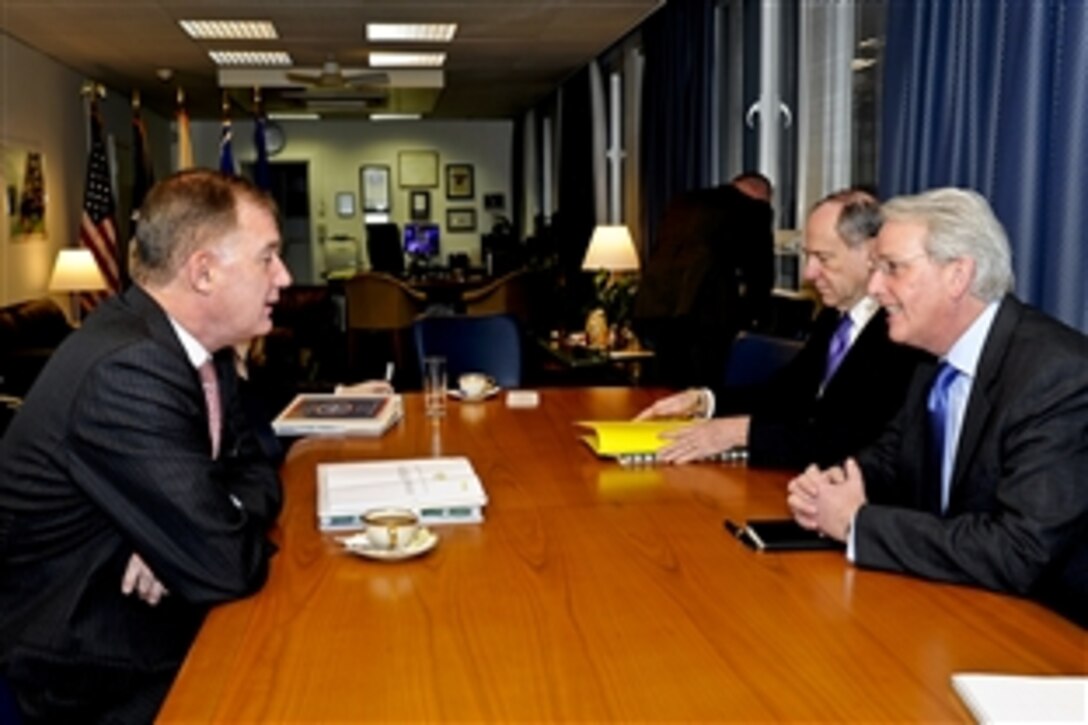 U.S. Deputy Defense Secretary William J. Lynn III meets with U.S. Ambassador to NATO Ivo Daalder at NATO headquarters in Brussels, Belgium, Jan. 24, 2011.