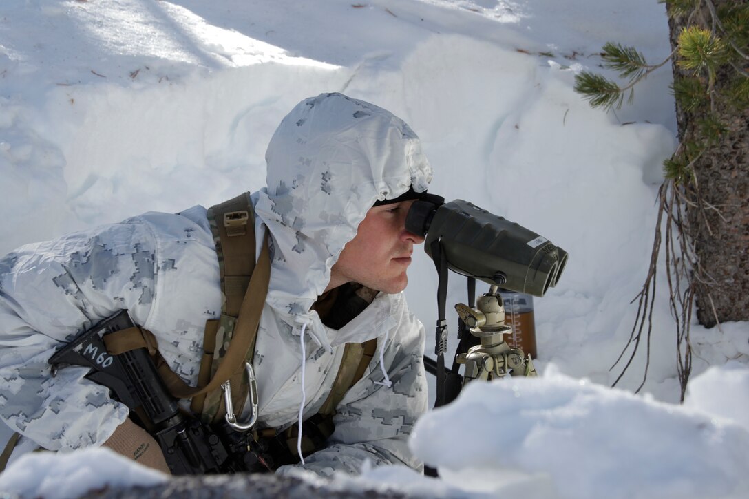 A scout sniper prepares his shot on target Jan. 24, 2011, during the Mountain Scout Sniper Course at Marine Corps Mountain Warfare Training Center Bridgeport.
