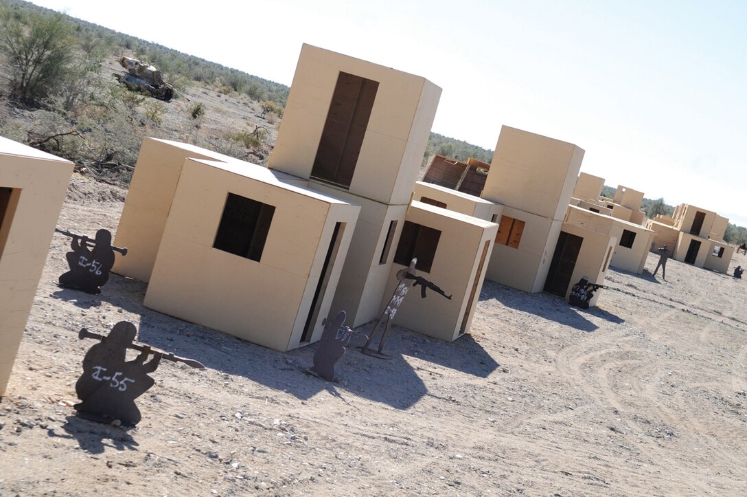 Steel targets simulating Afghan insurgents stand at the Al Brutus training complex within target area 15 North in the Chocolate Mountain Aerial Gunnery Range in California, Jan. 24, 2011. Al Brutus insurgent village, created in August 2009 and named after the call sign of Maj. Cesar Freitas who died in a 2007 Search and Rescue helicopter crash, is now the largest Afghan training complex on the Yuma-controlled ranges.