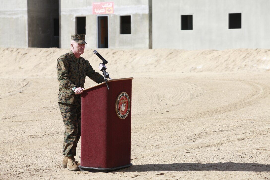 Brigadier Gen. H. Stacy Clardy III, the Combat Center’s commanding general, addresses attendees Jan. 25, 2011, during the ribbon cutting ceremony of the 274-acre Combined Arms Military Operations on Urban Terrain range complex, the Corps’ newest and largest range complex of its kind.