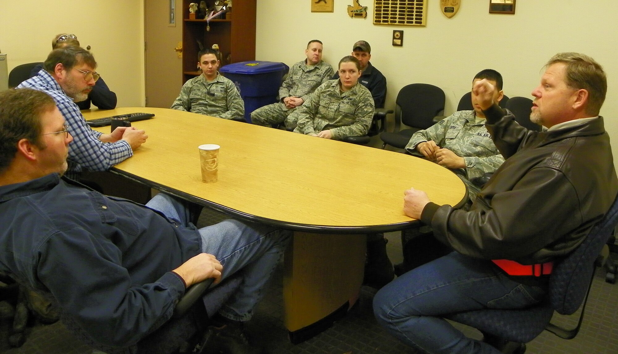 William Leipprandt, right, speaks with 354th Maintenance Squadron Age Flight Airmen during a site visit Jan. 11, 2011, Eielson Air Force Base, Alaska. Mr. Leipprandt is a member of the DOD Voluntary Protection Program team. (Courtesy Photo)