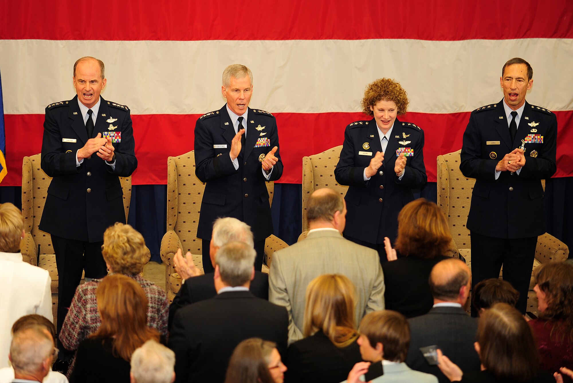 VANDENBERG AIR FORCE BASE, Calif. -- Gen. Kevin Chilton, commander, U.S. Strategic Command, Gen. William Shelton, Air Force Space Command commander, Lt. Gen. Susan Helms, commander of the Joint Functional Component Command for Space and 14th Air Force, and Lt. Gen. Larry James, former commander of JFCC Space and 14th Air Force, sing the Air Force song Jan. 21, 2011, following General Helms becoming the commander of JFCC Space and 14th Air Force.(U.S. Air Force photo/Senior Airman Andrew Satran)
