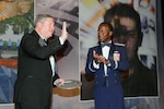 Secretary of the Air Force Michael Donley accepts an award from Gen. Edward Rice, Jr., Air Education and Training Command commander, Jan. 21 at the 2011 AETC Symposium Ball in San Antonio, Texas. Nearly a thousand Airmen from across the command gathered for the symposium and to hear Secratary Donley speak. (U.S. Air Force photo/by Don Lindsey) 