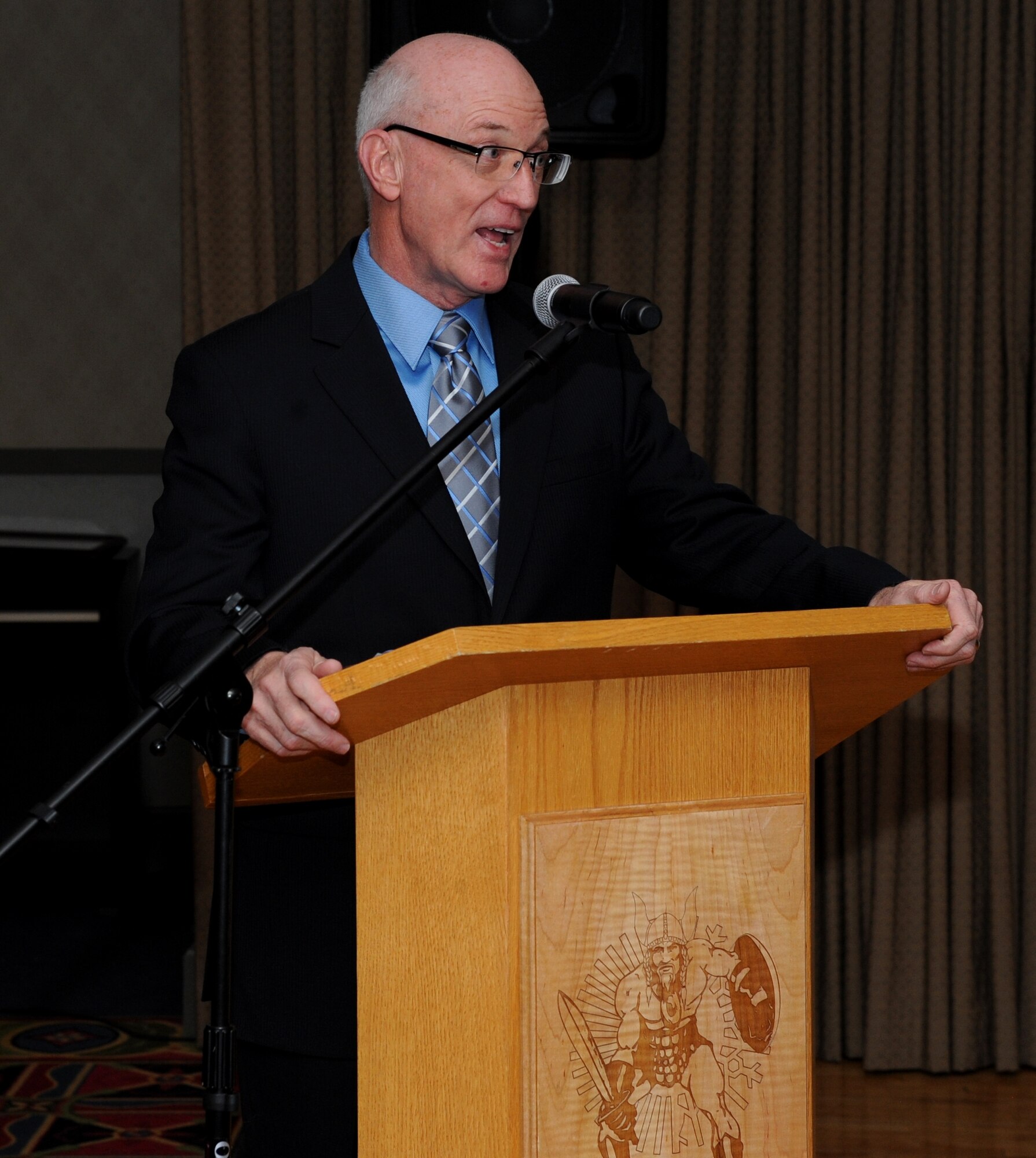 Chaplain Maj. Gen. Cecil R. Richardson, Chief of Chaplains, addresses guests at the National Prayer Dinner Gala at Grand Forks Air Force Base Jan. 21.  The gala’s theme, “Celebrating Courage through the Dark Times,” was demonstrated through video interviews of Airmen who have faced challenges and prayer readings from different denominations. (U.S. Air Force photo by Staff Sgt. Suellyn Nuckolls)