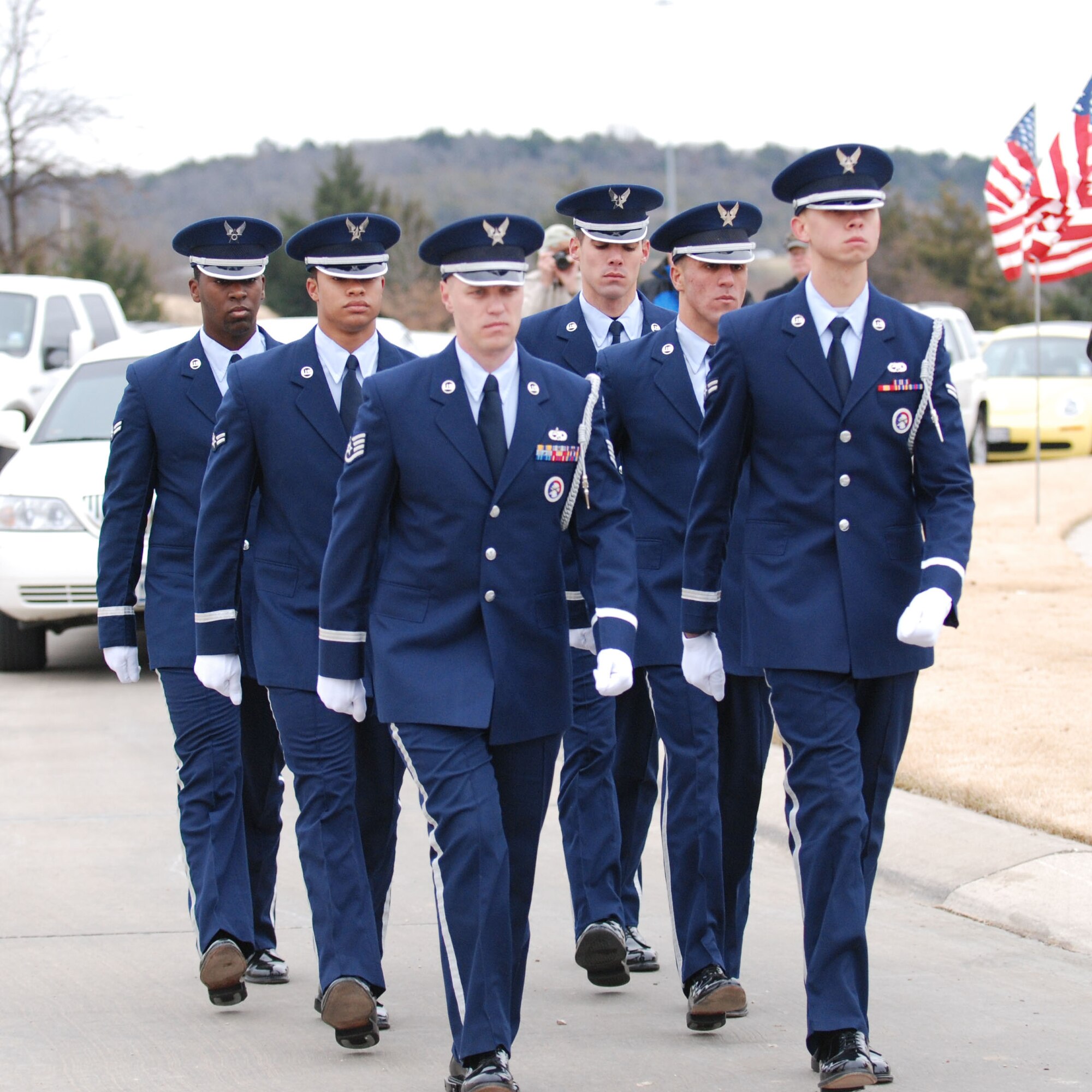 DALLAS—Honor Guard members from Dyess Air Force Base, Texas, march in formation Jan. 14 during a funeral ceremony at the Dallas-Fort Worth National Cemetery. More than 41 years ago, Col. James Dennany, 34, of Kalamazoo, Mich., and Maj. Robert Tucci, 27, of Detroit, were flying an F-4D escorting an AC-130 gunship on a night strike mission during the Vietnam War, when they were shot down by anti-aircraft gunfire. A search was conducted afterward, but revealed nothing. No other search was initiated due to heavy anti-aircraft fire in the area. In 1999, officials in Laos turned over crew-related equipment, two .38 caliber pistols and human remains. Scientists from the Joint POW/MIA Accounting Command used circumstantial evidence and forensic tools to identify the remains. Col. Dennany and Maj. Tucci were laid to rest Jan. 14 at the Dallas-Fort Worth National Cemetery. According to the Defense Prisoner of War/Missing Personnel Office, there are still 1,713 U.S. servicemen still unaccounted for from the Vietnam War. (U.S Air Force photo/ Airman 1st Class Shannon Hall)