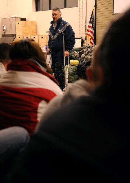 MOODY AIR FORCE BASE, Ga.-- Col. Randall Richert, 820th Base Defense Group, speaks to members of the 822nd Base Defense Squadron and their families before they deploy to Iraq Jan. 23. Fifteen members of the 822nd BDS traveled to Fort Dix, N.J., for training before deploying to Iraq provideing a force protection mission.  (U.S. Air Force photo/Airman 1st Class Benjamin Wiseman)(RELEASED)