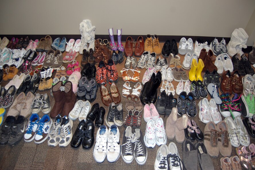 Members of the 926th Group recently assisted in sending 156 pairs of donated shoes to those in need through the Soles4Souls program. (U.S. Air Force photo/Tech. Sgt. Amy Bailey)