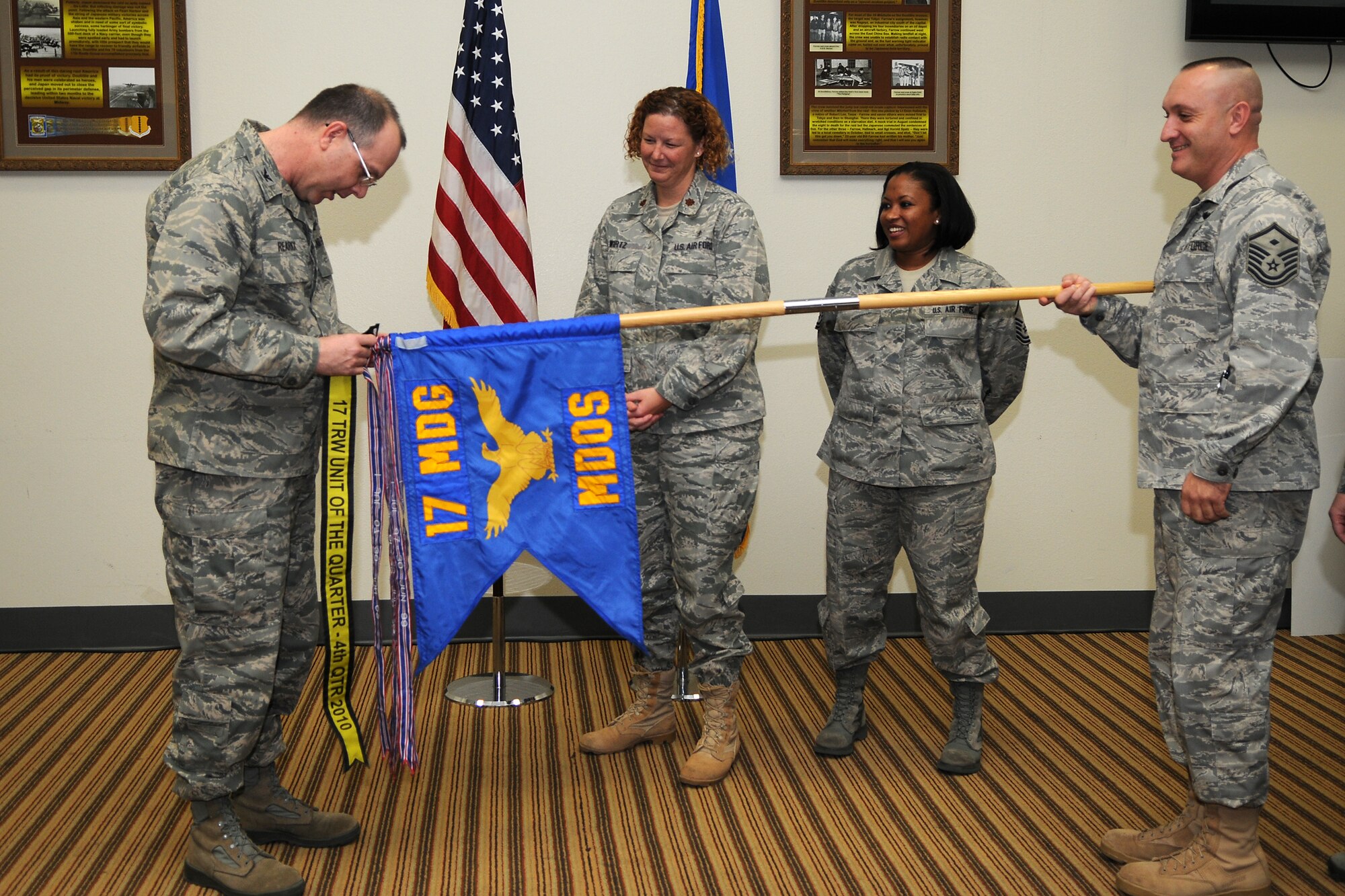GOODFELLOW AIR FORCE BASE, Texas - Col. David Rearick, 17th Training Wing Vice Commander, presents the Unit of the Quarter award to the 17th Medical Operations Squadron during the awards ceremony Jan. 25. (U.S. Air Force photo/Staff Sgt. Heather Rodgers)