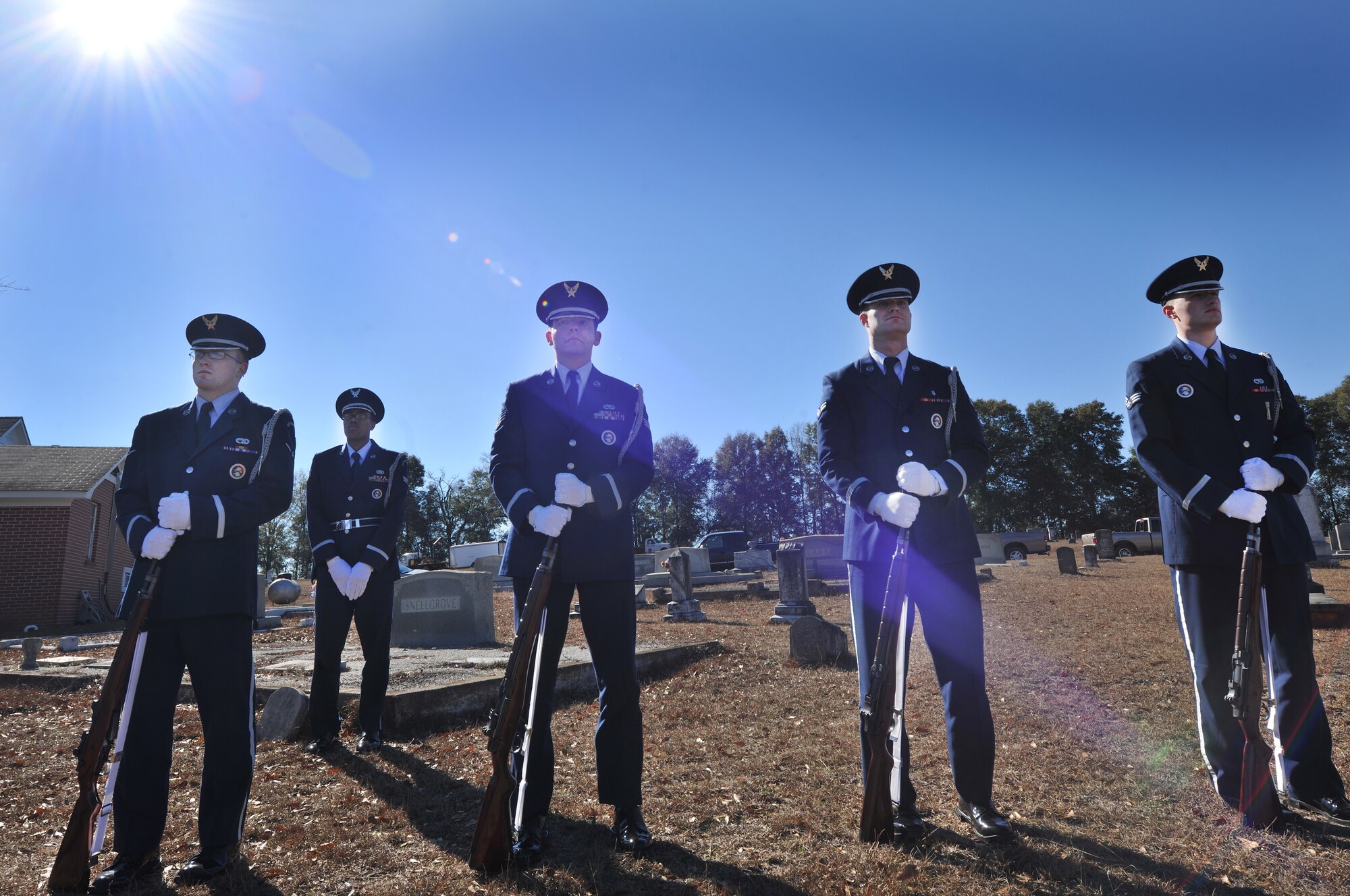 OZARK, Ala.-- The Eglin Air Force Base Honor Guard prepares to give military honors in the form of a 3-volley rifle salute during a memorial service Jan. 22. 1st Lt. Robert Franklin Dees, a  430th Fighter-Bomber Squadron, 474th Fighter Bomber Group F-84E Thunderjet fighter pilot whose aircraft was shot down over North Korea in 1952 on a combat mission during the Korean war. Airmen from Eglin from the honor guard presided over the memorial and presented the flag to the family member at the end of the memorial service. (U.S. Air Force photo/Airman 1st Class Joshua Green)(RELEASED)
