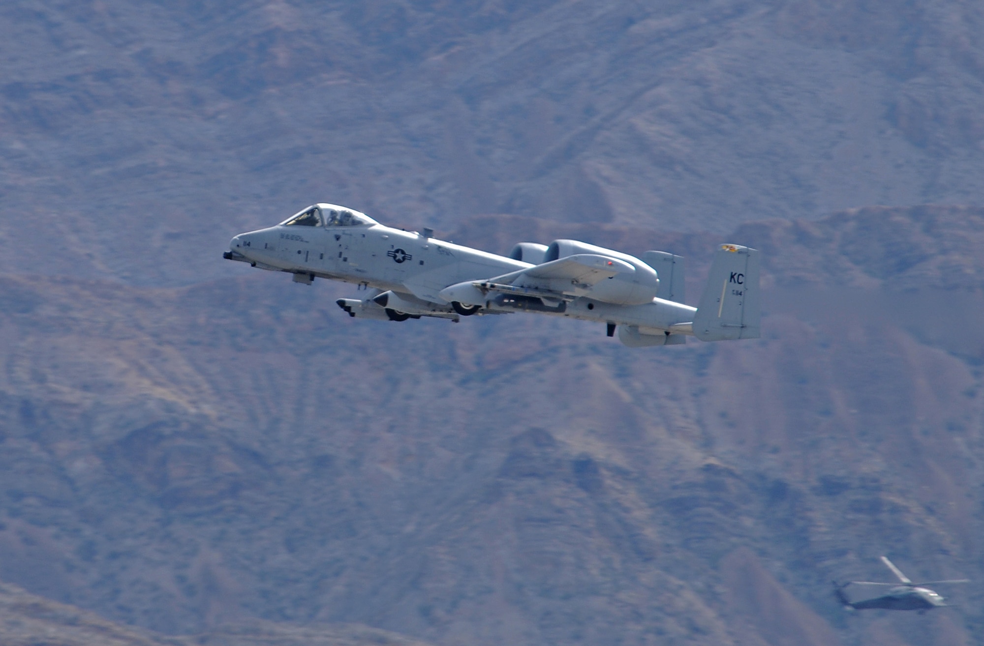 NELLIS AIR FORCE BASE, Nev. -- An A-10 Thunderbolt II deployed from the 442nd Fighter Squadron, Whiteman Air Force Base, Mo., takes off from the flightline during the first day of Red Flag 11-2 Jan. 24. Red Flag is a combined exercise that provides a realistic combat training environment to the U.S. and its allies. (U.S. Air Force photo/Staff Sgt. Benjamin Wilson)