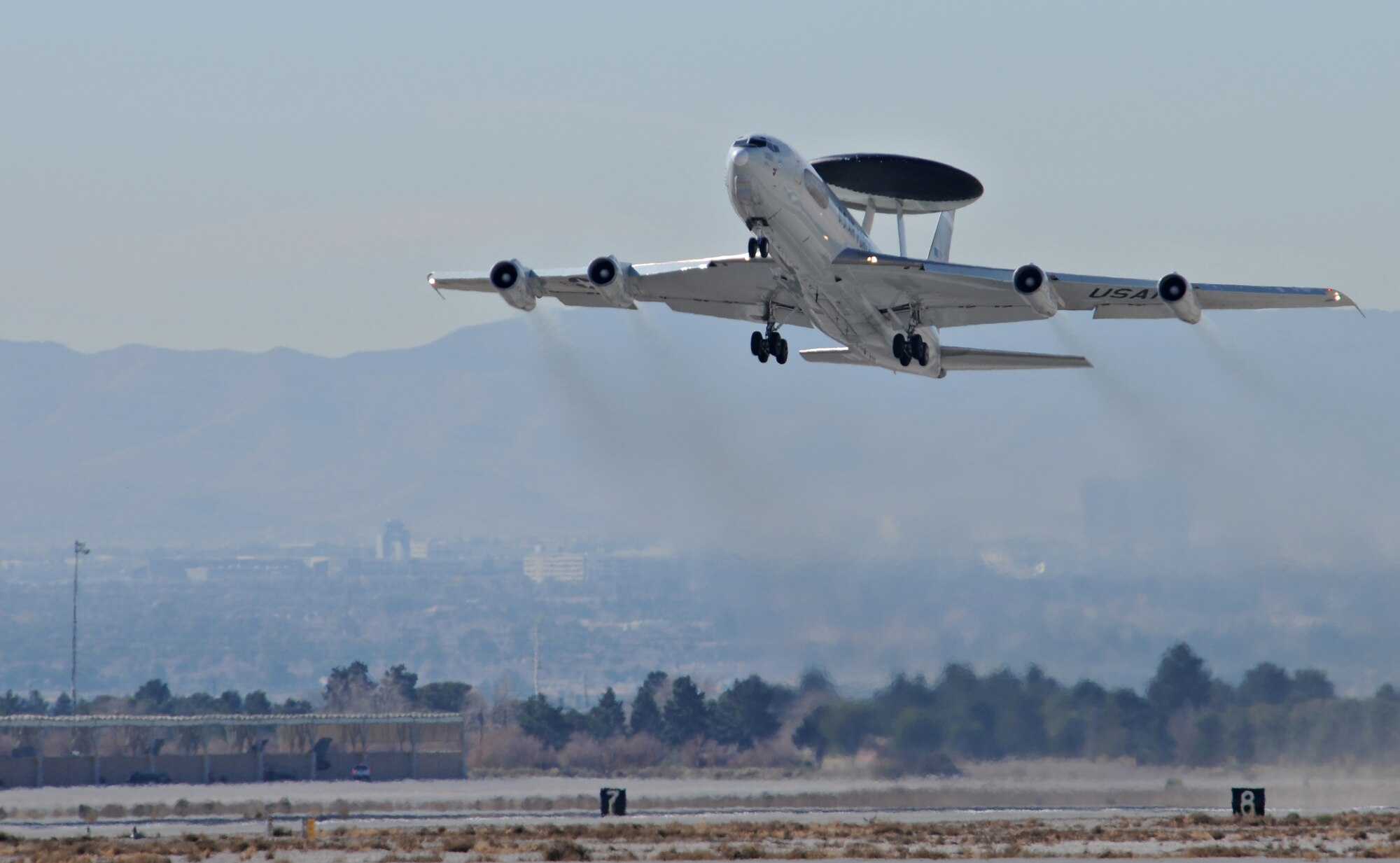 NELLIS AIR FORCE BASE, Nev. -- An E-3 Sentry deployed from 552nd Air Control Wing, Tinker Air Force Base, Okla., takes off from the flightline during the first day of Red Flag 11-2 Jan. 24. Red Flag is a combined exercise that provides a realistic combat training environment to the U.S. and its allies. (U.S. Air Force photo/Staff Sgt. Benjamin Wilson)