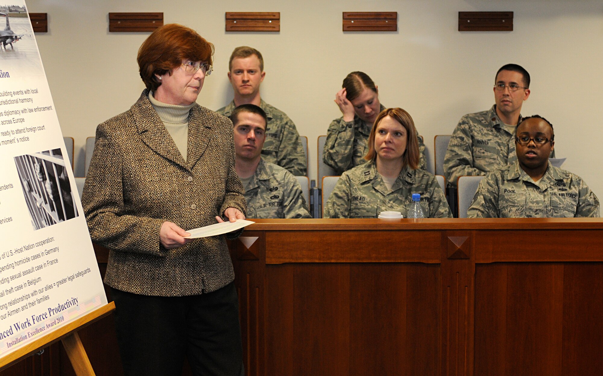 SPANGDAHLEM AIR BASE, Germany – Johanna Bromme, 52nd Fighter Wing Legal Office, listens to a question from Col. Timothy Fay, Installation Excellence Selection Board member and 2nd Bomb Wing commander from Barksdale Air Force Base, La., during the legal office’s presentation for the Air Force's Installation Excellence and Special Recognition Award evaluation Jan. 25. The IEA selection board started their two-day evaluation of Spangdahlem Air Base and its award package Jan. 25 to select a winner between Travis Air Force Base, Calif., and Spangdahlem AB. (U.S. Air Force photo/Senior Airman Clay Murray)