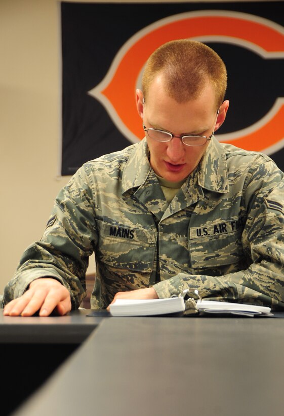 Airman 1st Class Christian Mains, 28th Aircraft Maintenance Squadron able chief, studies a B-1B Lancer technical order at Ellsworth Air Force Base, S.D., Jan. 21.  B-1 able chief Airmen must attend 22 academic days, consisting of 108 hours of training, at Detachment 8, 372nd Training Squadron at Ellsworth. (U.S. Air Force photo/Senior Airman Anthony Sanchelli)