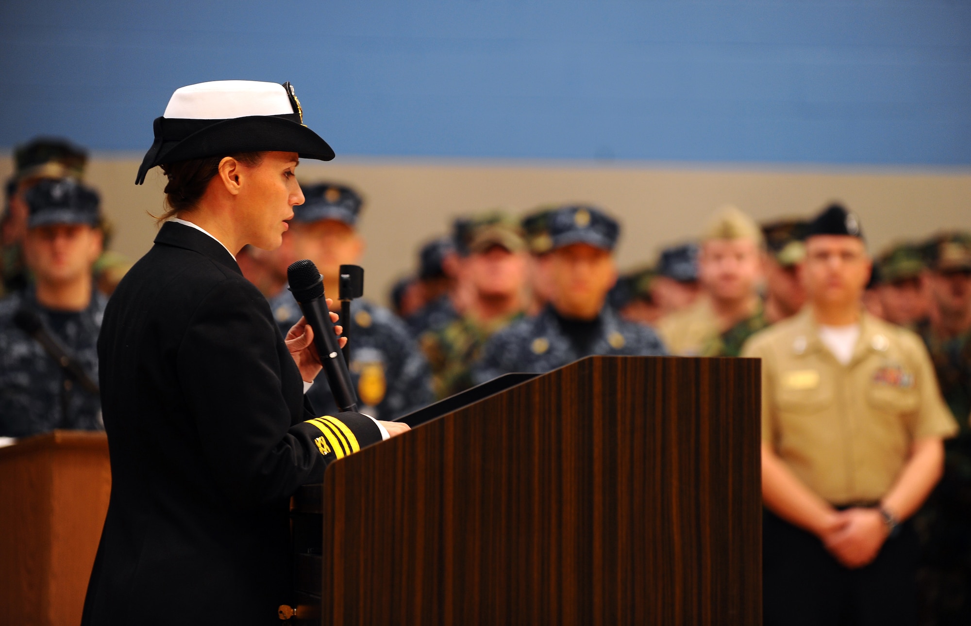 OFFUTT AIR FORCE BASE, Neb. - Navy Lt. Cmdr. Leticia Soto, Naval Civil Engineer Corps, provides remarks in the newly constructed Navy Operational Support Center prior to the ribbon cutting ceremony located here, Jan. 22.  The 19,000-square foot, $4.3 million NOSC is now located behind Offutt's gates from its previous location in North Omaha, were it has been since 1965. U.S. Air Force Photo by Josh Plueger (released)
