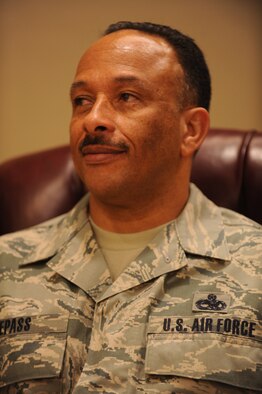 MOODY AIR FORCE BASE, Ga. -- While Captain Kyle Dishman, 336th Recruiting Squadron flight commander, gives a speech Chief Master Sgt. Alejandro DePass, 723rd Aircraft Maintenance Squadron superintendent, listens Jan. 25. The speech was about Chief DePass and all of his achievements. (U.S. Air Force photo/Airman 1st Class Douglas Ellis)(RELEASED)