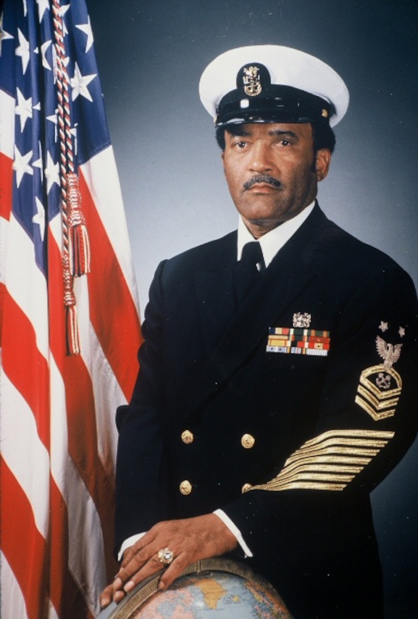 Carl Brashear, seen here as a master chief petty officer, poses for an official photo. Brashear enlisted in the Navy in 1948, shortly after the Navy had desegregated. In the face of widespread racial discrimination, he graduated from the U.S. Navy Diving & Salvage School in 1954, becoming the first African-American to do so. (Photo courtesy/Chief Warrant Officer 4 Phillip Brashear) (RELEASED)