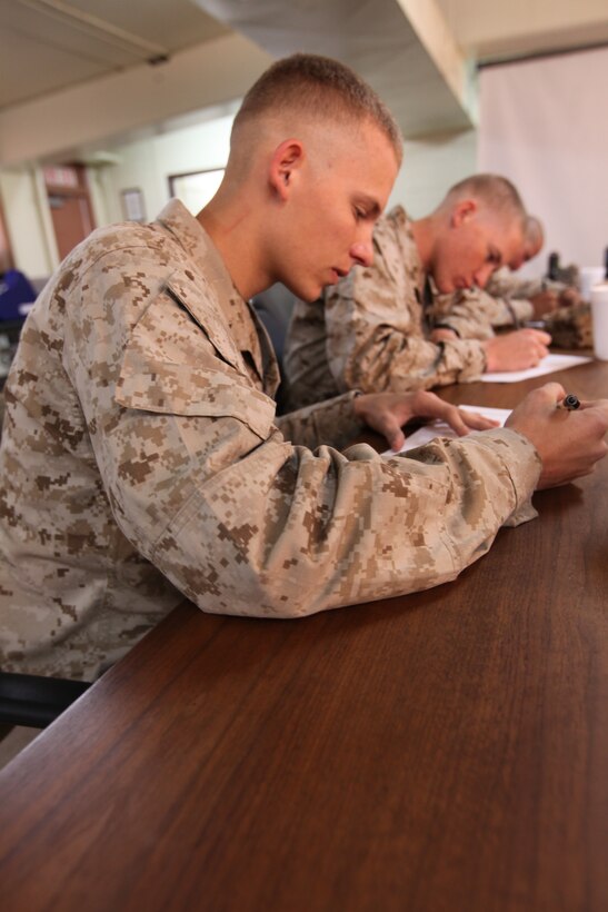 Lance Cpl. Cody Henrichsen, a rifleman with Alpha Company, 1st Battalion, 23rd Marine Regiment, fills out a questionnaire that each set of brothers received prior to the shoot with CNN that came to Camp Pendleton, Calif., Jan. 25. The 1/23 has five sets of brothers in the battalion, all scheduled to deploy together within the next few weeks.