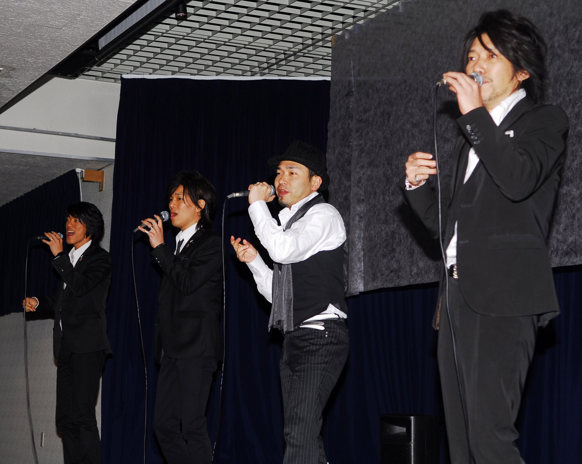 YOKOTA AIR BASE, Japan -- Members from Voxray, a local Japanese band, perform for guests in attendance at the Joint New Year's Party held here Jan. 23. (U.S. Air Force photo/Airman 1st Class Lynsie Nichols)