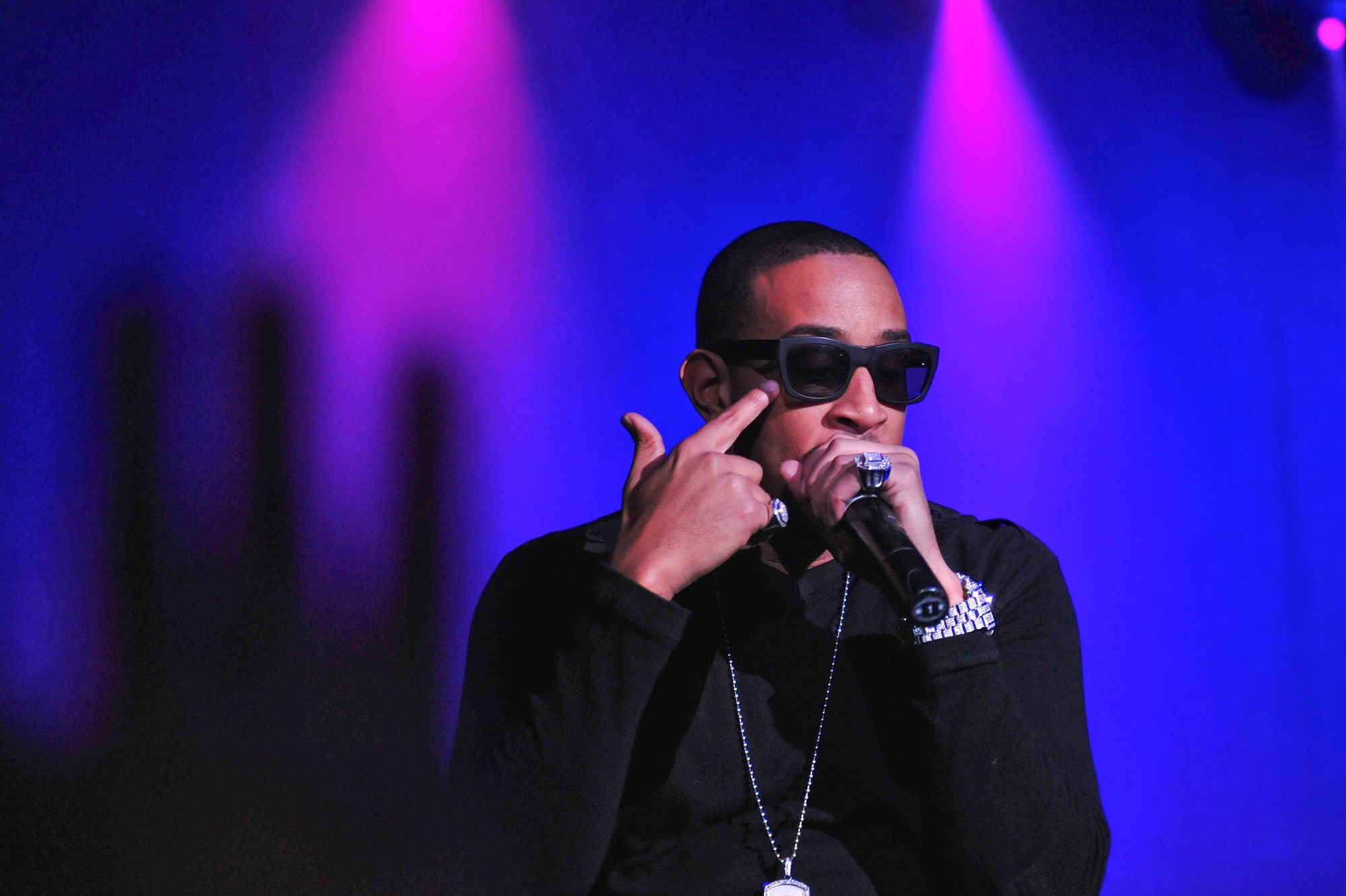 ANCHORAGE, Alaska -- Chris ?Ludacris? Bridges gestures as he performs at the Sullivan Arena Jan. 20. Approximately 2,000 tickets for the concert were given to service members and their families from the Air Force Reserve. (U.S. Air Force Photo by Senior Airman Kristin High)