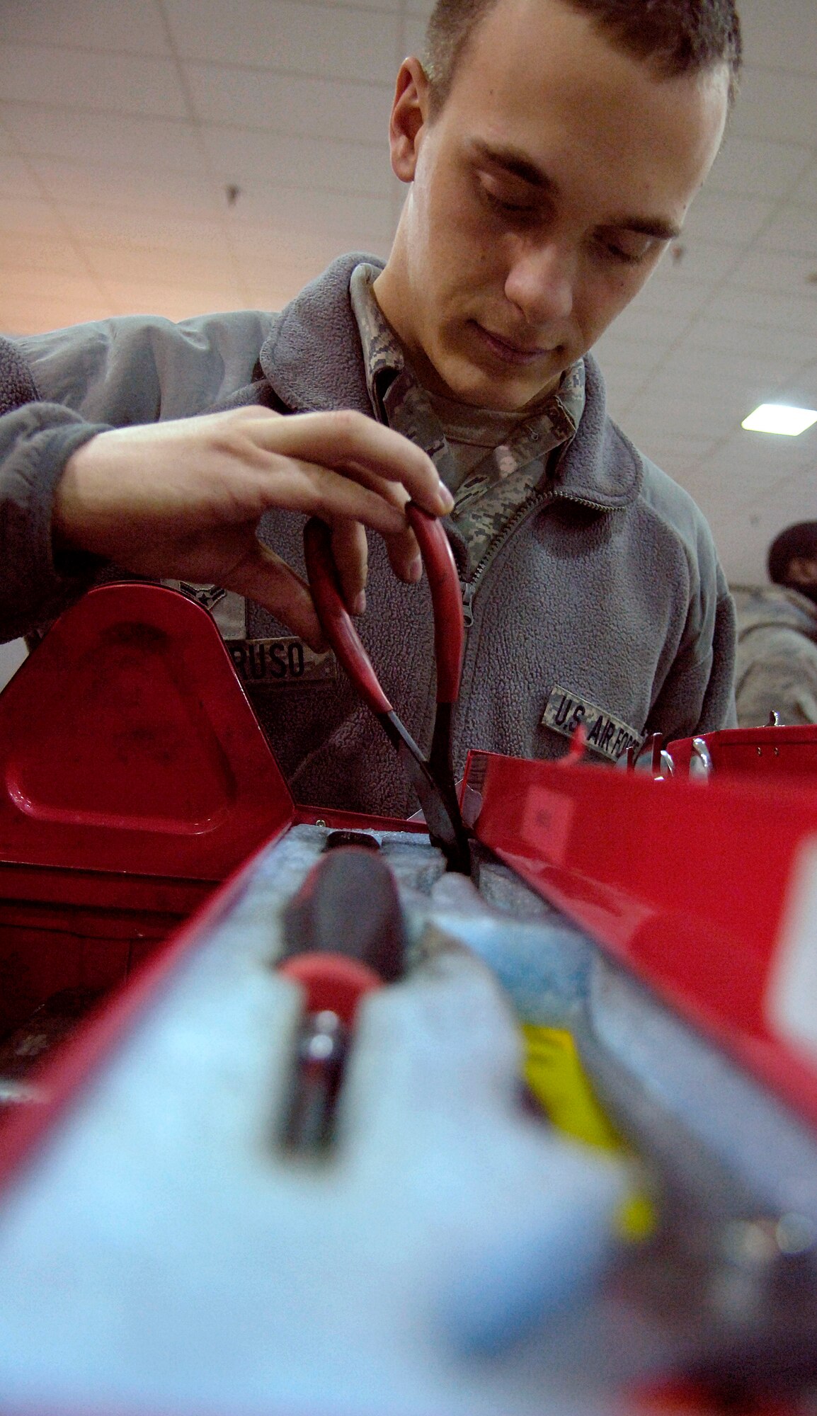 Airman 1st Class Joseph Tenebruso, 92nd Maintenance Squadron crew chief, checks that a tool box he’s taking to Geiger Field at the Spokane International Airport has the necessary tools needed to maintain a KC-135 Stratotankers Jan. 20, 2011. Tools are kept at Fairchild Air Force Base because it has a hangar to keep them in. They are transported to Geiger Field for maintenance procedures. (U.S. Air Force photo/Senior Airman Natasha E. Stannard)