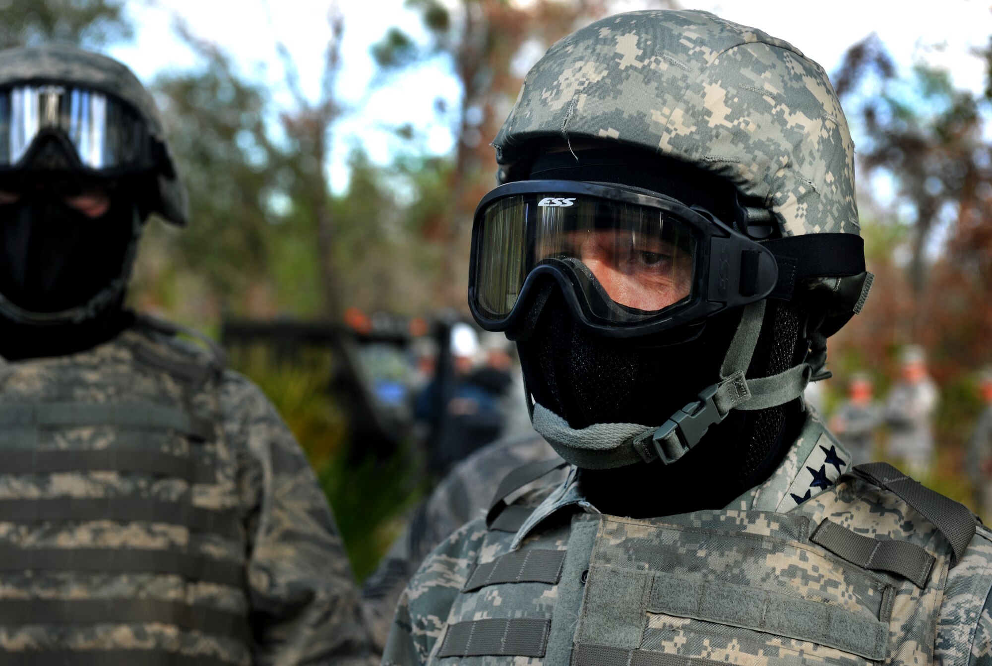CAMP BLANDING, Fla.  -- Gen. William M. Fraser III, commander of Air Combat Command, talks to an Airmen about the ground combat training course Jan. 24. General Fraser was given proper protective gear prior to the start of the course including a helmet, flak vest and goggles. (U.S. Air Force photo/Airman 1st Class Joshua Green)

