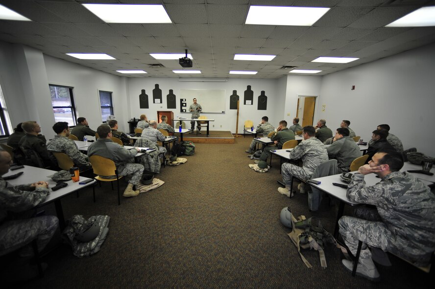 U.S. Air Force Senior Airman Anthony Montz, Combat Arms Training and Maintenance instructor, teaches Hurlburt Airmen to properly disassemble and clean the M-9 pistol, Hurlburt Field, Fla., Jan. 24, 2011. Hurlburt Field employs 13 skilled instructors and trains 800-1,000 students monthly. (U.S. Air Force photo by Staff Sgt. Stephanie Jacobs/RELEASED)





