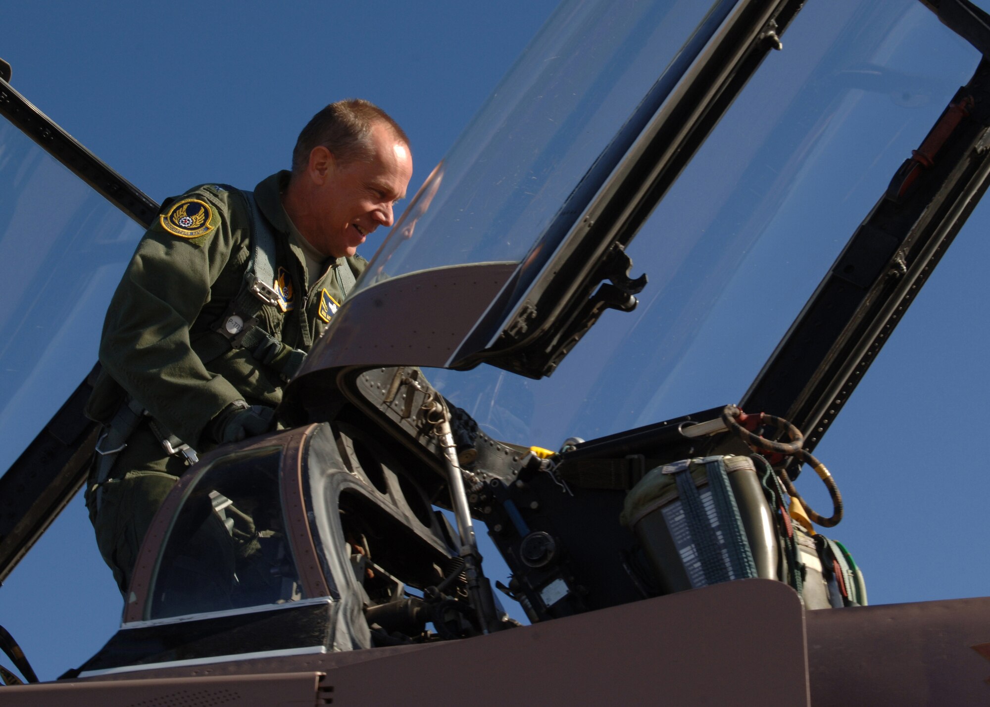Gen.  Donald Hoffman, Air Force Materiel Command commander, climbs into a QF-4 Phantom II during his visit to Holloman Air Force Base, N.M., Jan. 21, 2011. The QF-4 is modified from a baseline F-4 aircraft and can be flown remotely by a ground controller or by a pilot in the cockpit.  (U.S. Air Force photo/Senior Airman Michael Means)