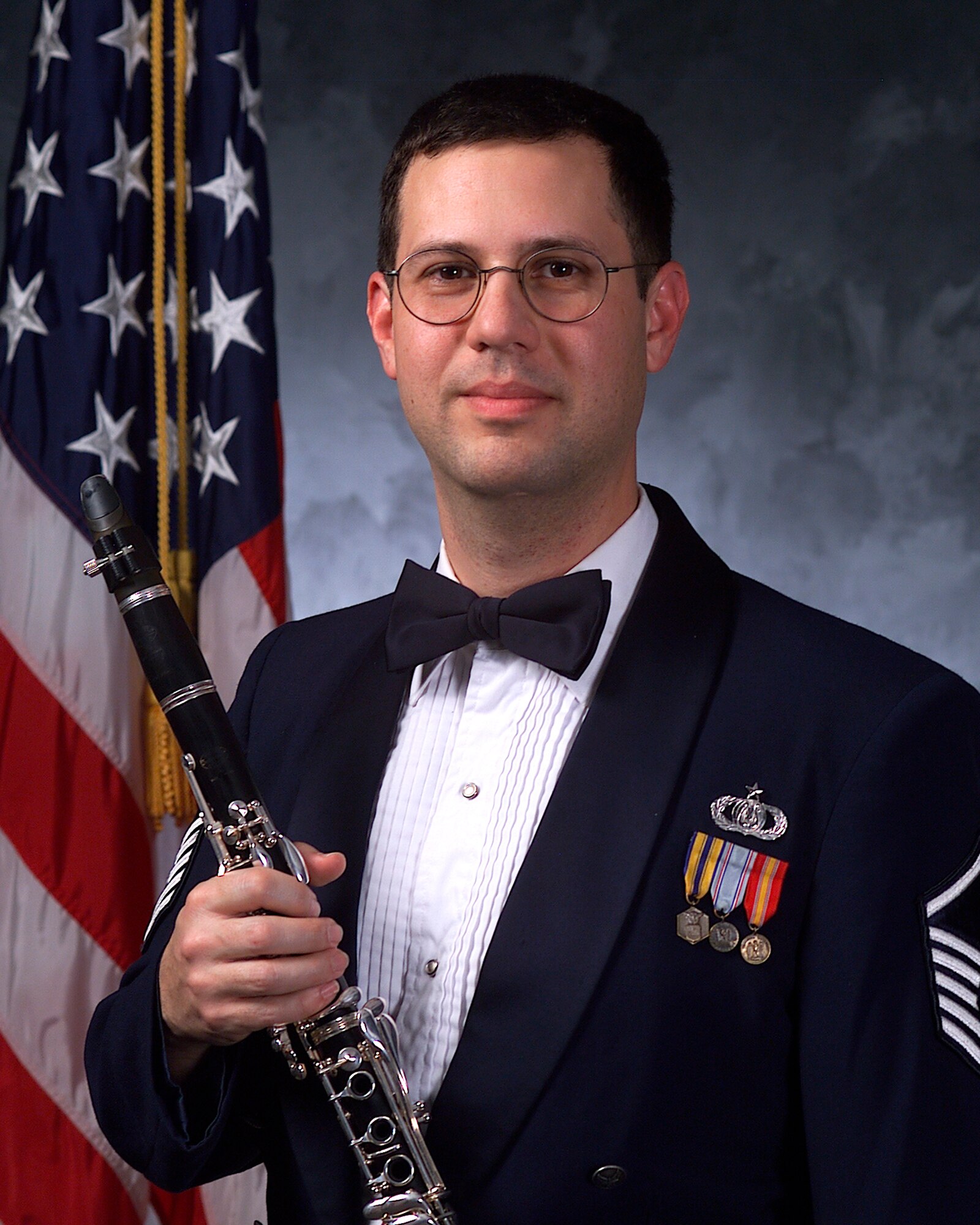 Master Sgt. John Romano, bass clarinetist with the Concert Band, performed at the United States Navy International Saxophone Symposium.  He was featured in William Albright’s “Pit Band”, along with the Concert Band’s Master Sgt. Jeremy Koch.  The USAF Band regularly represents the very best of the men and women of the United States Air Force at music conferences, clinics and symposiums—often before the most esteemed industry leaders and professionals.