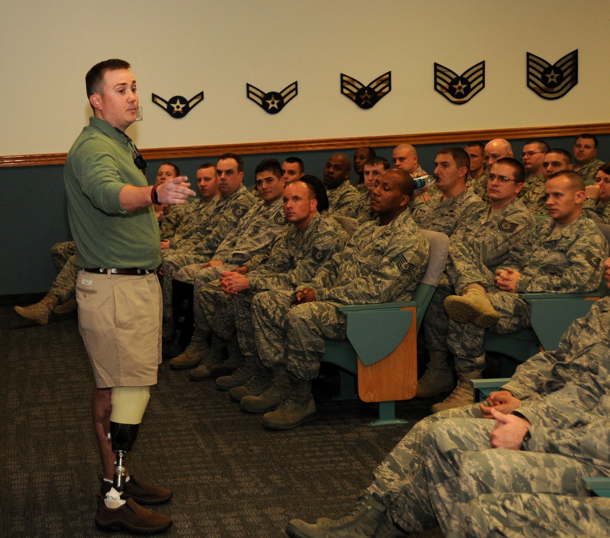 Staff Sgt. David Flowers speaks to students at the Mathies NCO Academy Jan. 20.
Sergeant Flowers, an instructor at Eglin Air Force Base, Fla., lost his right leg in a landmine explosion while deployed to Afghanistan. He was one of 18 Airmen cited for their bravery and heroism in the fifth volume of the Air Force’s “Portraits in Courage” released in December. Sergeant Flowers, who also spoke to students at Airman Leadership School, made the trip to Keesler while visiting family members in Biloxi and Diamondhead, Miss.  (U.S. Air Force photo by Senior Airman Eric Summers Jr.)